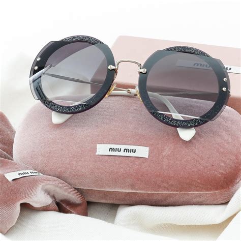oculos miu miu redondo